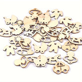 Collection of wooden cutout shapes on a white background