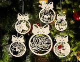 Decorative Christmas ornaments with reindeer and 'Merry Christmas' text on a tree.