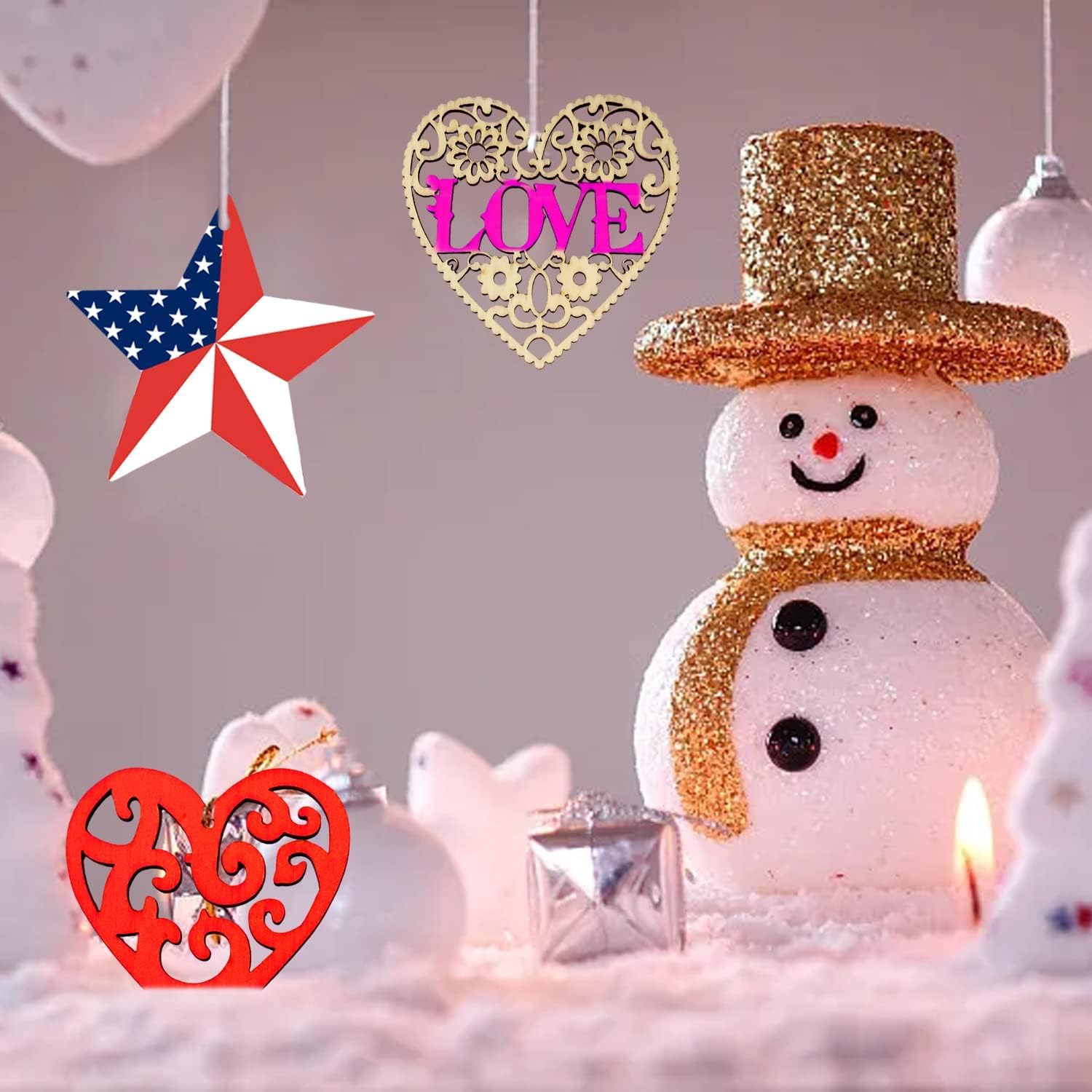 Decorative snowman with gold hat and scarf, surrounded by festive decorations including a star, heart with 'LOVE' text, and red heart with intricate design.