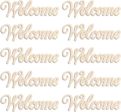 Wooden 'Welcome' signs in various orientations