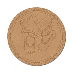 Round cardboard cutout of a foot with jewelry on a white background