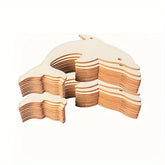 Stack of wooden whale-shaped cutouts on a white background