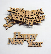 Wooden letters spelling out 'Happy New Year' on a white background