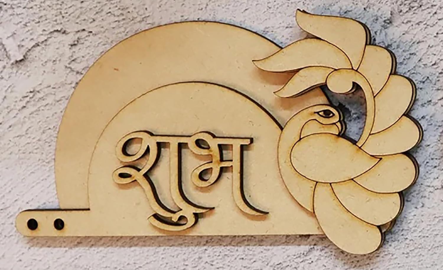 Decorative wooden wall art with a bird and 'Shiva' text on a textured wall.