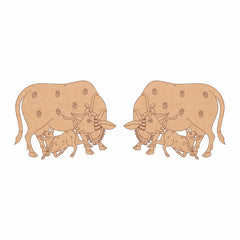 Wooden cutout of a bull and calf design on a white background