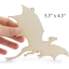 Wooden dragon-shaped ornament held by a hand with dimensions displayed.