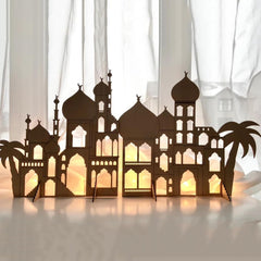 Decorative cityscape with illuminated windows on a white background