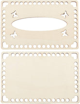 Two beige metal dies with butterfly and heart cutouts on a white background