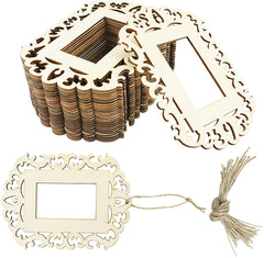 Set of wooden photo frames with decorative cutouts and string on a white background