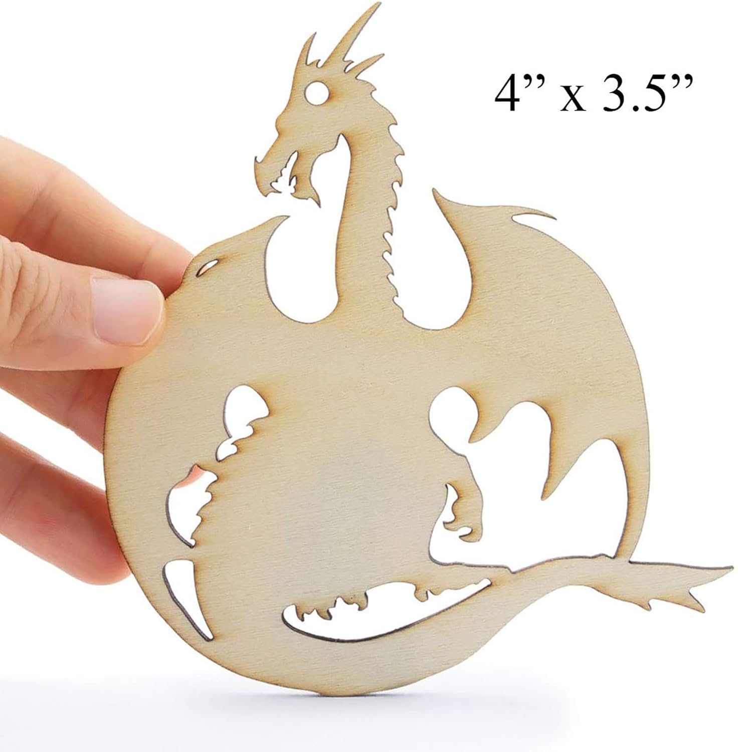 Wooden dragon ornament held by a hand with dimensions '4'' x 3.5'''.