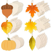 Set of autumn-themed paper decorations including acorns, leaves, and pumpkins on a white background.