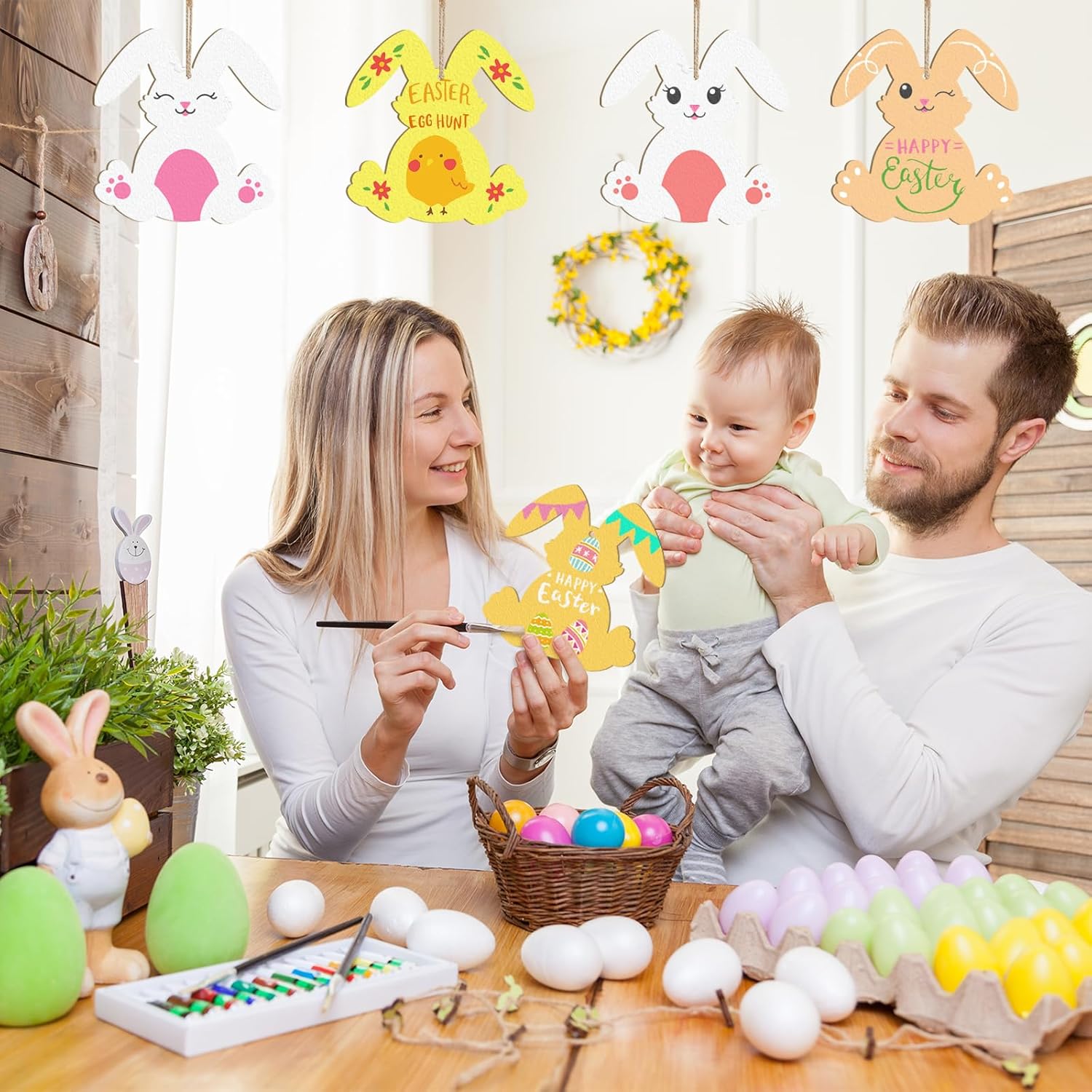 Family at a table with Easter decorations and activities