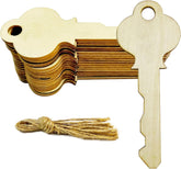 Stack of wooden key-shaped tags with a tassel on a white background