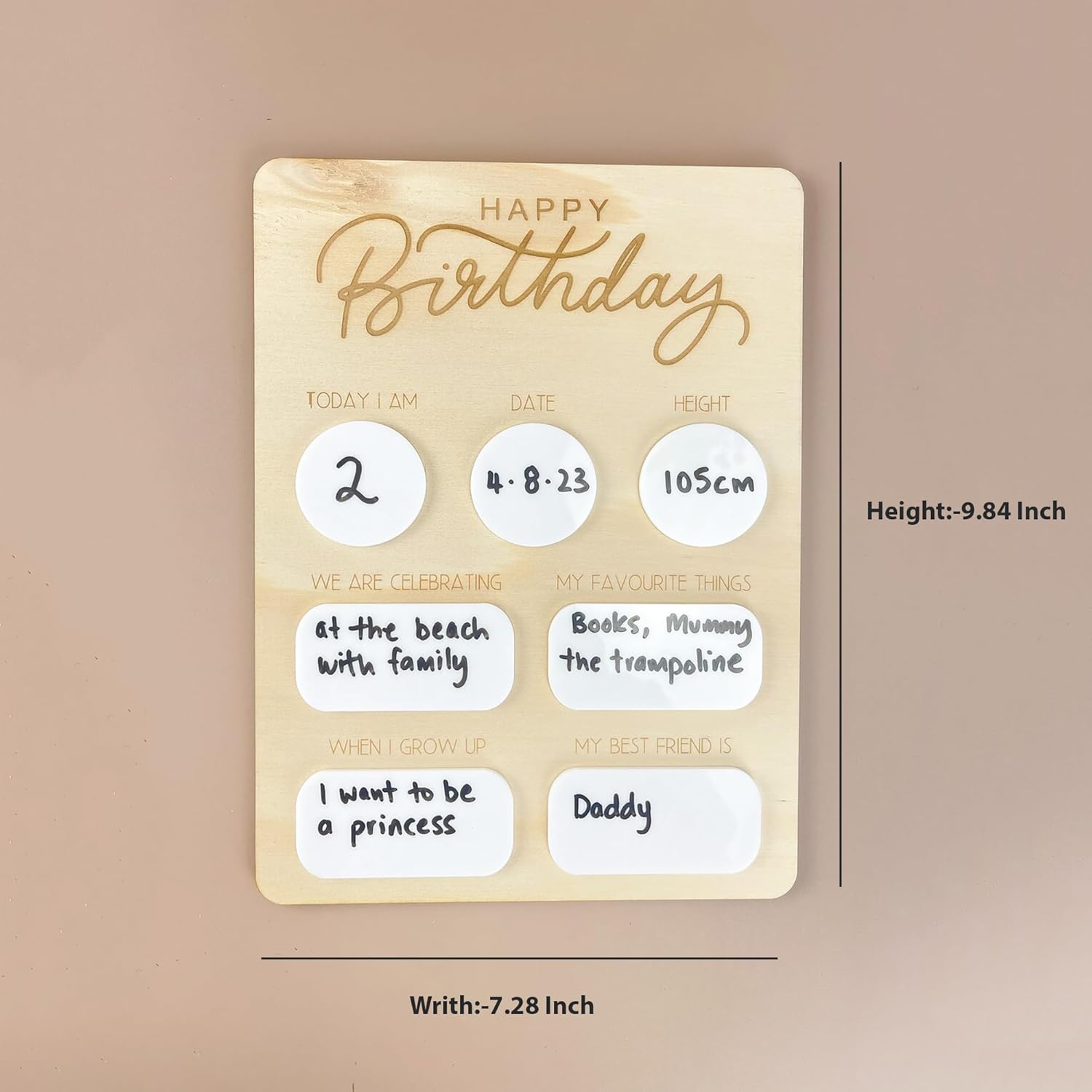 Wooden plaque with birthday information on a beige background