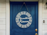 Decorative sign with 'Ramadan Kareem' on a blue door