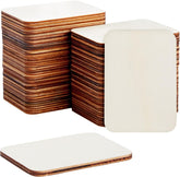 Stack of wooden coasters with white pads on a white background