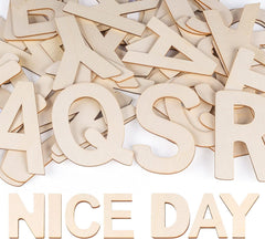 Wooden letters spelling 'NICE DAY' on a white background