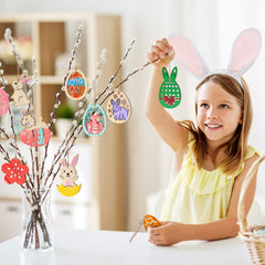 Child wearing bunny ears with Easter decorations on a branch