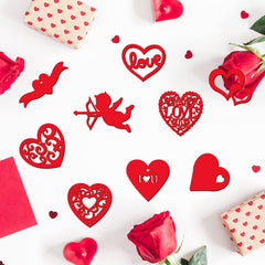 Red heart-shaped decorations and roses on a white background