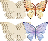 Butterfly-shaped wooden cutouts with stained glass designs on a white background