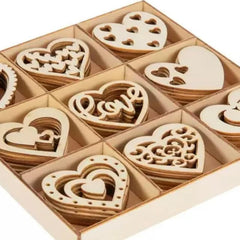 Wooden heart-shaped decorations in a box