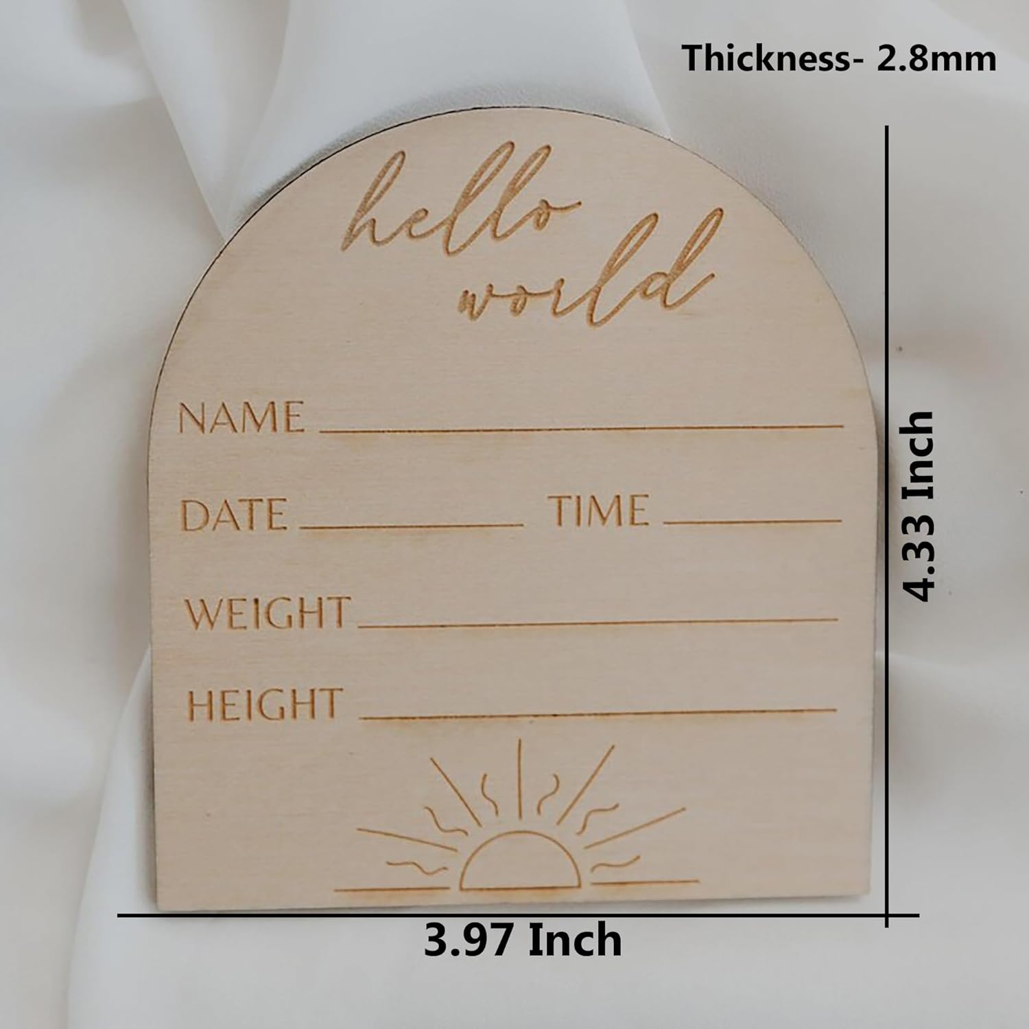 Wooden baby milestone board with 'hello world' text and measurement details on a white background