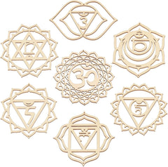 Set of wooden chakra symbols on a white background