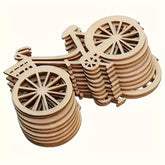 Stack of wooden bicycle models on a white background