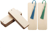 Wooden bookmarks with tassels on a white background