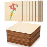 Stack of wooden coasters with floral design on a white background