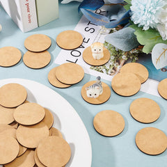 Round wooden coasters on a table with decorative items and text.