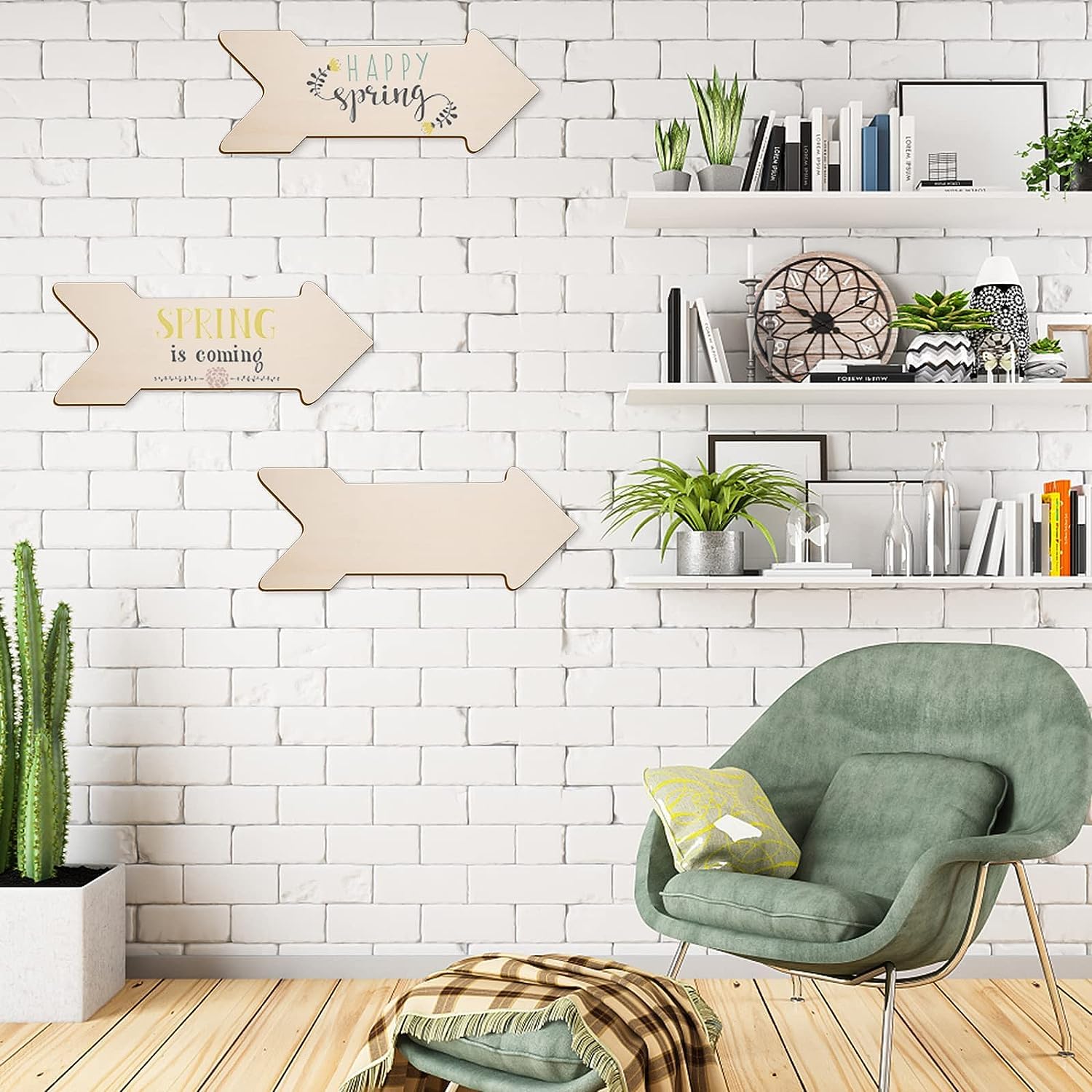 Modern living room with a green armchair, white brick wall, and decorative elements.