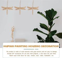 Wooden dragonfly decorations, a small statue, and a plant on a white surface with text about MUPIAN PAINTING HOUSING DECORATION.