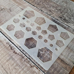 Geometric patterned stencil on a wooden surface