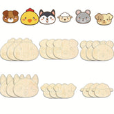 Set of wooden animal-shaped cutouts on a white background