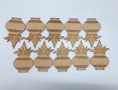Set of laser cut decorative elements on a light gray background