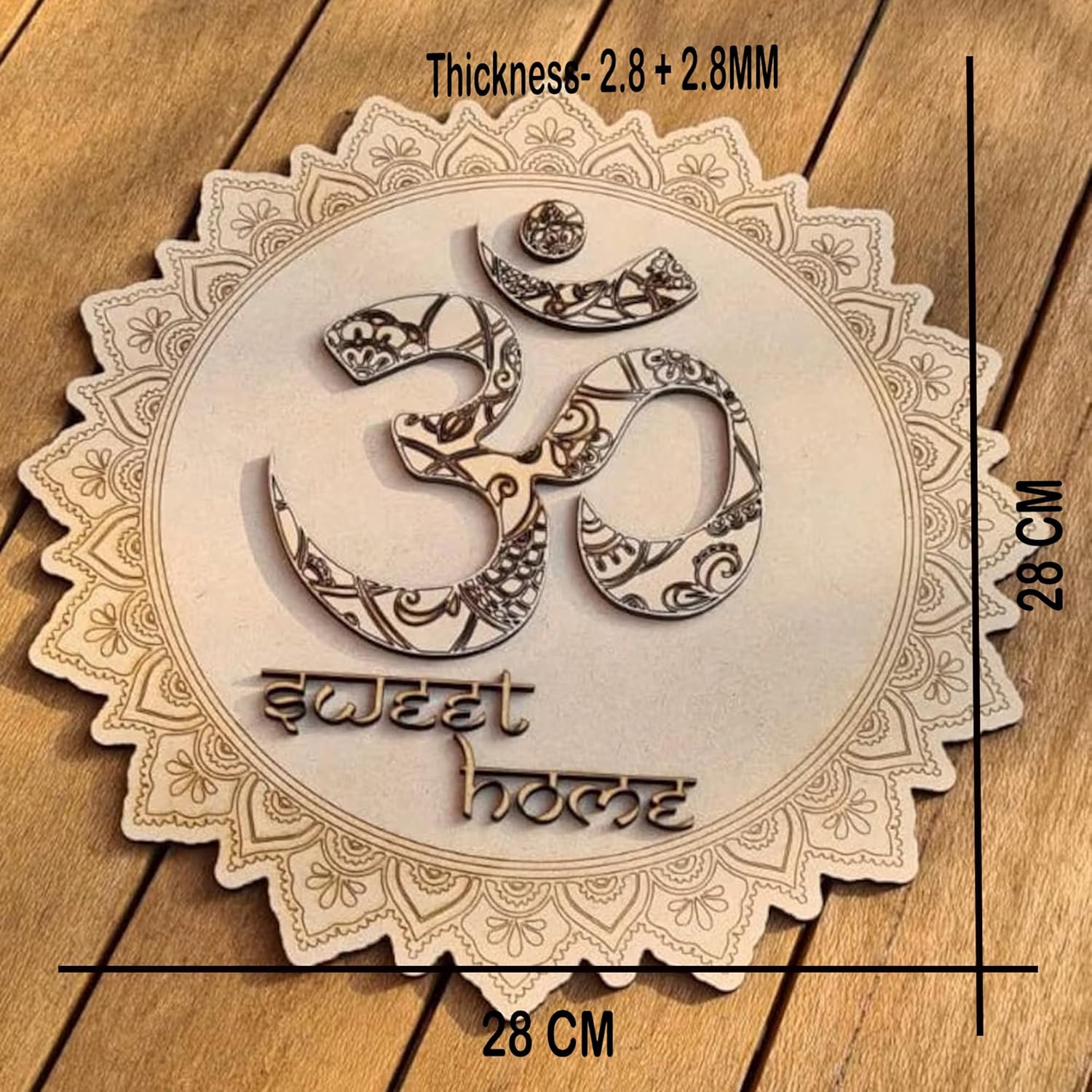 Decorative wooden plaque with 'sweet home' text and measurements on a wooden background