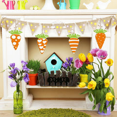 Decorative shelf with a birdhouse, flowers, and Easter-themed decorations.