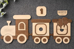 Wooden train toy with decorative elements on a textured surface