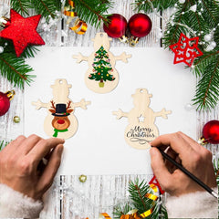 Decorative Christmas ornaments being painted on a festive background with trees and ornaments.