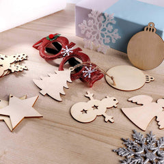 Wooden Christmas ornaments on a wooden surface with a decorative box in the background.