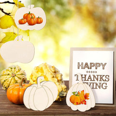 Decorative pumpkins and gourds with a 'Happy Thanksgiving' sign on a wooden surface.