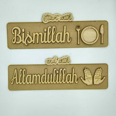 Two wooden signs with engraved text and symbols on a white background