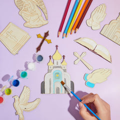 Coloring craft set with religious-themed items on a purple background