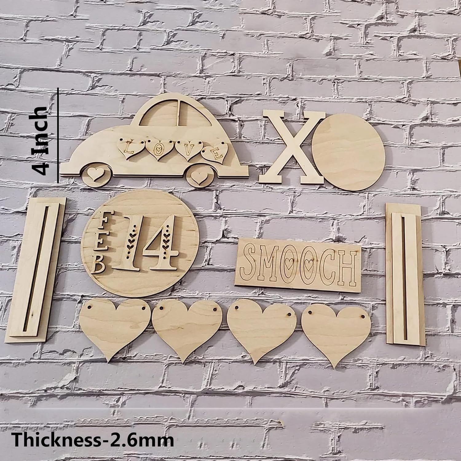 Set of wooden decorative pieces with car, hearts, and text on a brick wall background