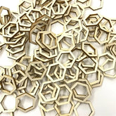 Collection of wooden hexagonal shapes on a white background