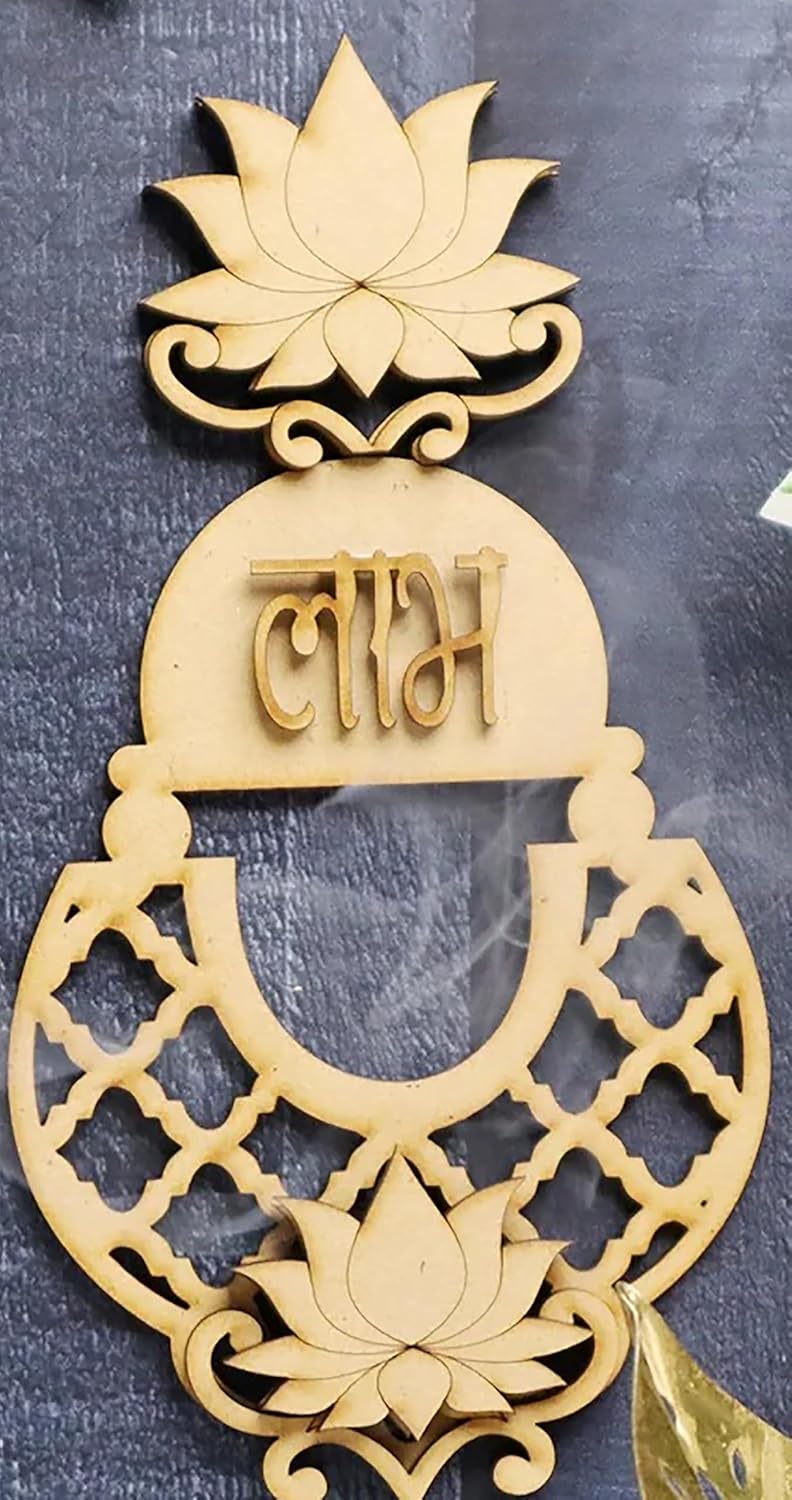 Decorative wall hanging with lotus design and gold text on a dark background