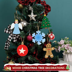 Decorated Christmas tree with various ornaments against a teal background