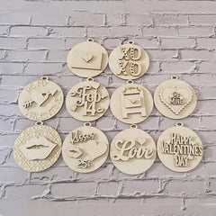 Decorative wooden ornaments with various inscriptions on a gray brick wall background