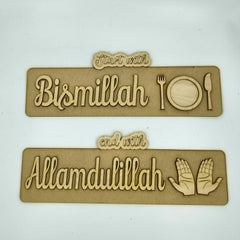 Two wooden signs with engraved text and symbols on a white background